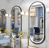 Black frame oval mirror